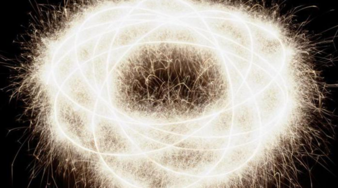 Abstrakt bilde av en roterende elektron